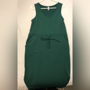 Casual Dark Green drawstring waist midi length dress. Size medium. Gently used